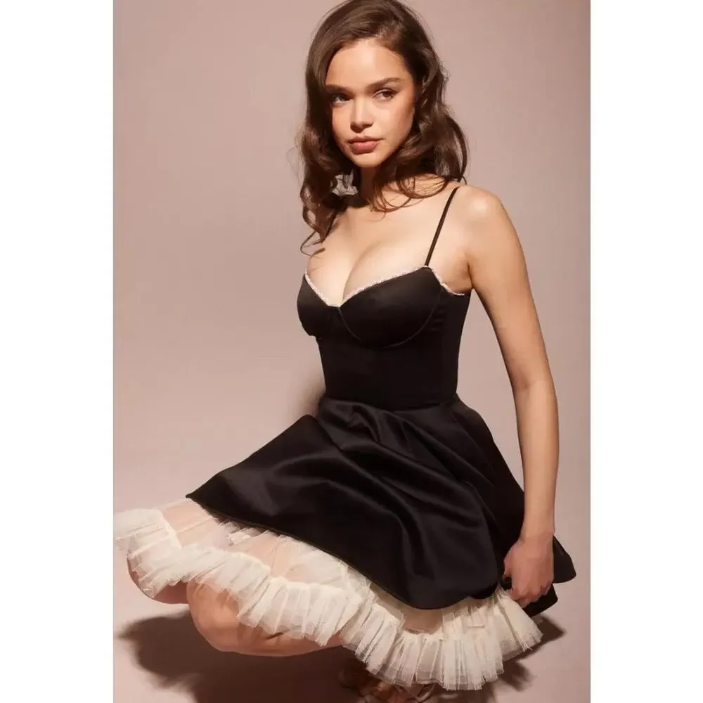 MINIMOISELLE Small
BLACK TULLE MINI DRESS $300
House of CB - Picture 1 of 6